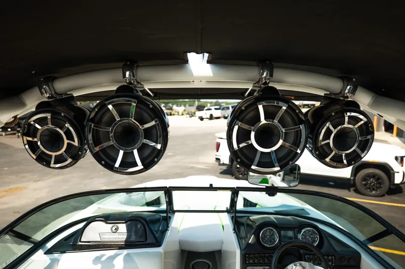 Slide: The Image of 2015 Moomba Mojo boat interior with premium audio speakers and dashboard view. - 22