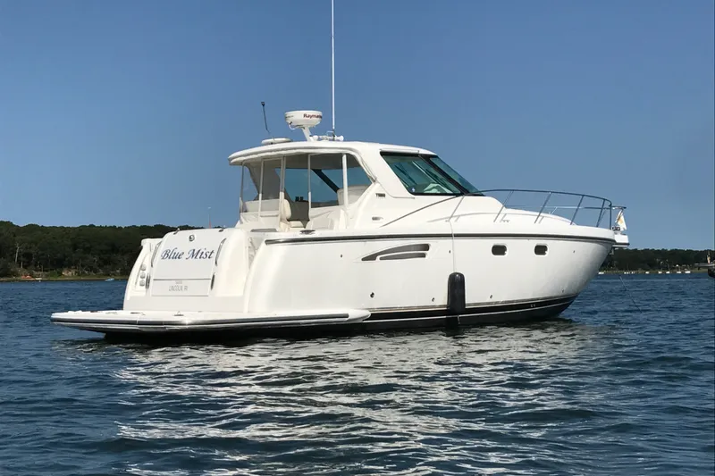 The Image of 2007 Tiara Yachts 3600 Sovran boat on calm water, clear sky background. - 0