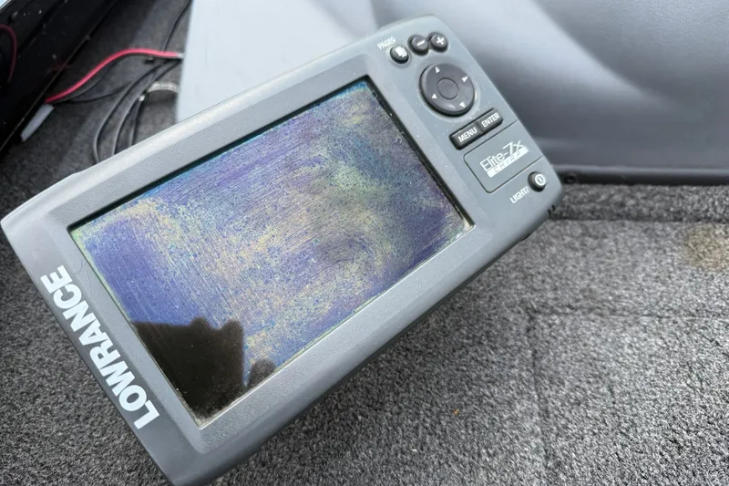 Slide: The Image of Lowrance Elite-7x fishfinder on 2014 Lowe Stinger 175 boat, displaying a colorful screen. - 9