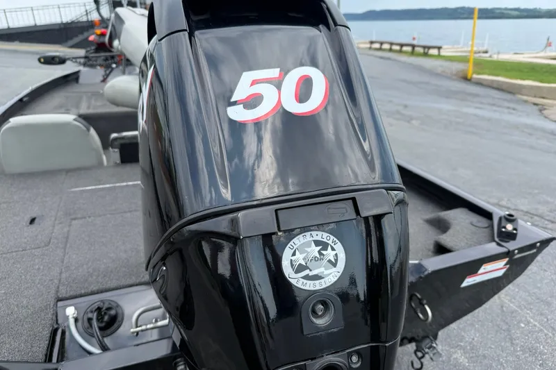 Slide: The Image of 2014 Lowe Stinger 175 boat with a 50 HP ultra-low emission engine. - 5