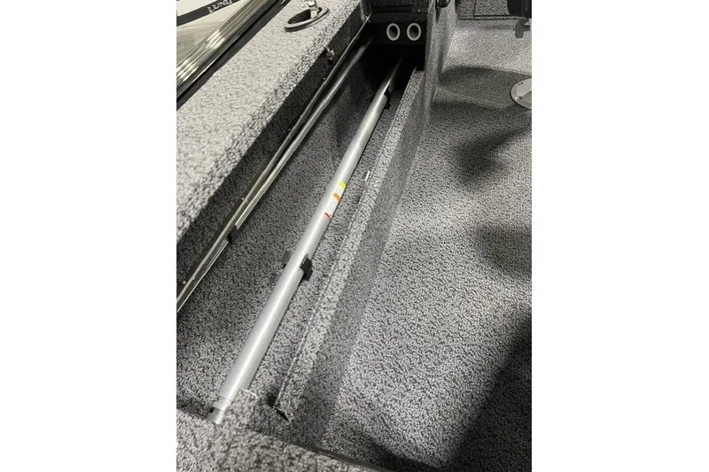 Slide: The Image of Interior view of 2027 Lund 1875 Impact XS boat storage compartment. - 12