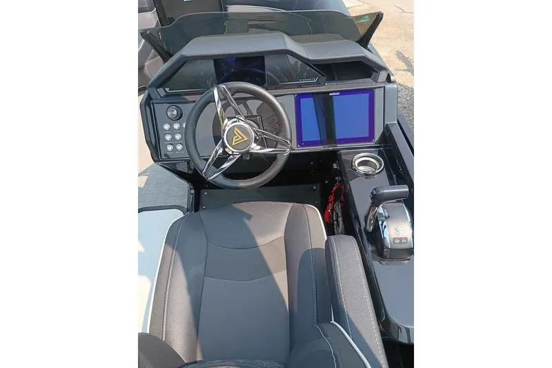Slide: The Image of 2024 Viaggio Diamante U 22 boat dashboard with steering wheel and digital display. - 4