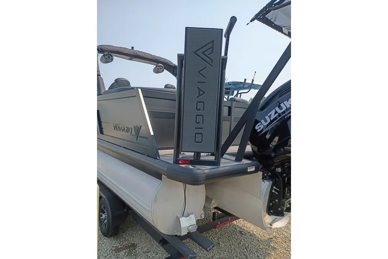 Slide: The Image of 2024 Viaggio Diamante U 22 boat with Suzuki engine, showcasing sleek design and branding. - 3