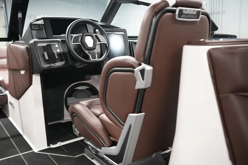 Slide: The Image of 2024 Supra SA 450 interior with brown leather seats and modern dashboard design. - 18