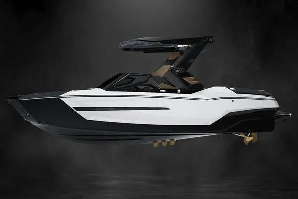 The Image of 2027 MasterCraft X24 boat with sleek design and modern features, showcased on a dark background. - 1