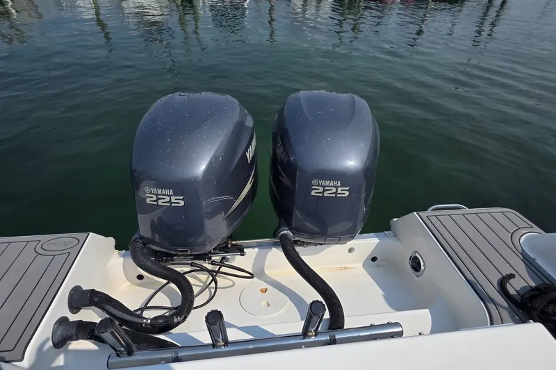 Slide: The Image of Twin Yamaha 225 outboard engines on a 2005 Wellcraft 290 Coastal boat. - 14