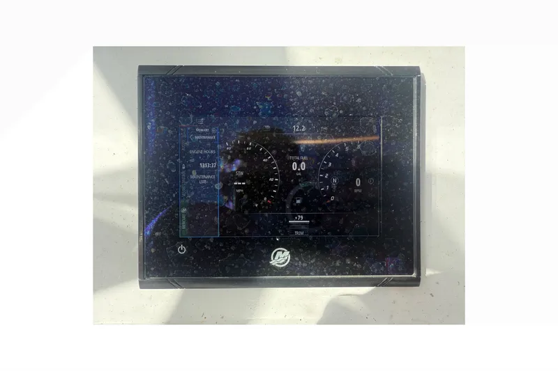 Slide: The Image of Digital display on a 2018 Conch 30 boat showing engine metrics and maintenance data. - 26