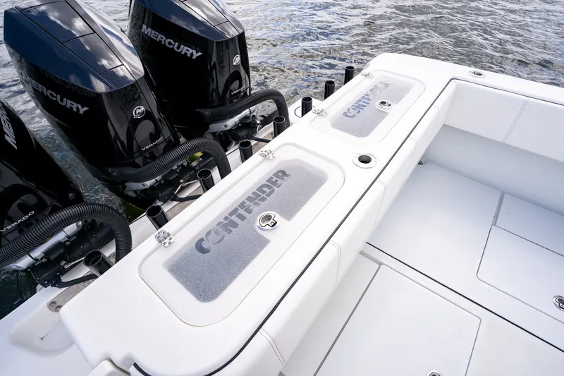 Slide: The Image of 2025 Contender 39 ST boat with Mercury engines on water. - 47