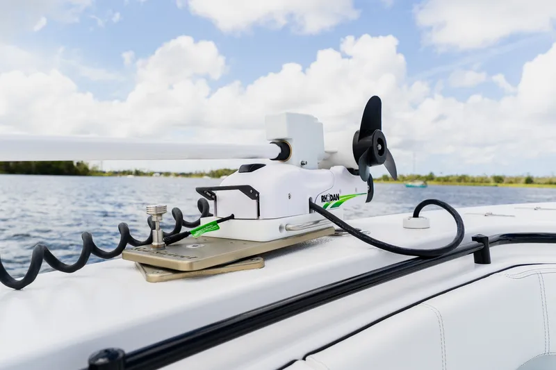 Slide: The Image of 2025 Contender 39 ST boat with mounted Rodan trolling motor on deck. - 16