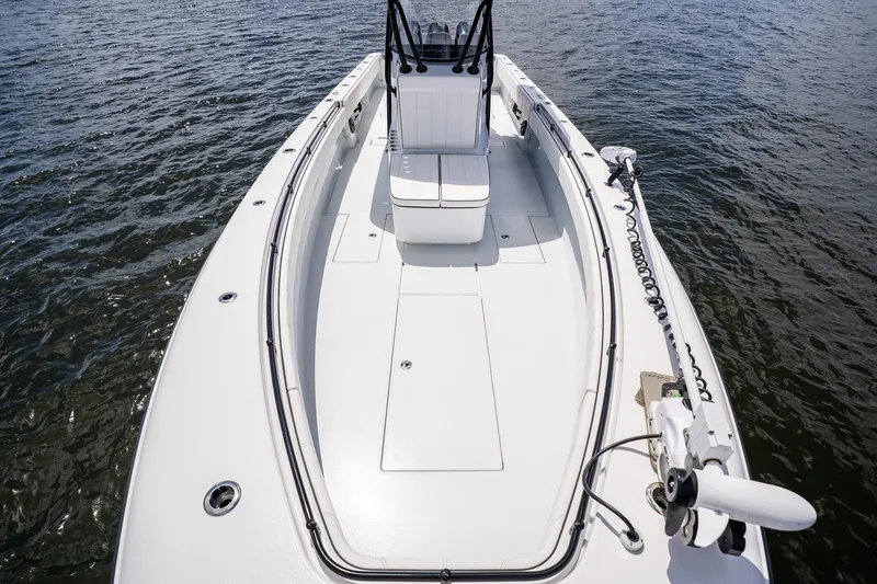 Slide: The Image of 2025 Contender 39 ST boat on water, showcasing sleek deck design and modern features. - 19