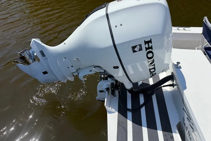 Slide: The Image of 2020 Seaway 24 boat with Honda outboard motor on water. - 39