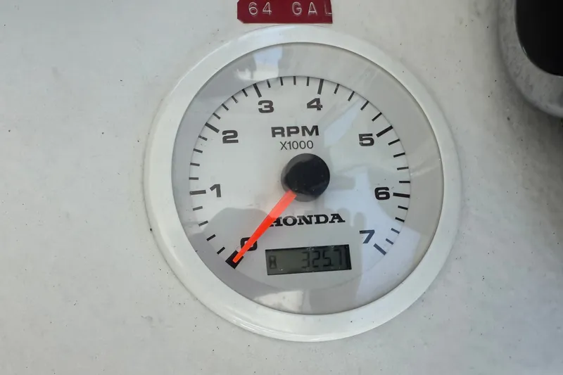 Slide: The Image of Tachometer on 2020 Seaway 24 boat, displaying 3257 RPM, with Honda branding. - 14