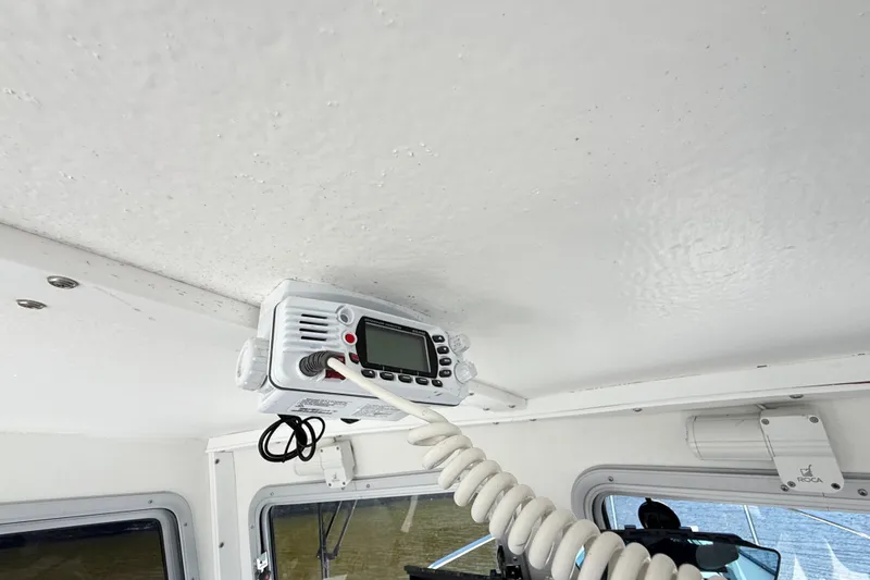 Slide: The Image of Ceiling-mounted radio in a 2020 Seaway 24 boat cabin interior. - 15