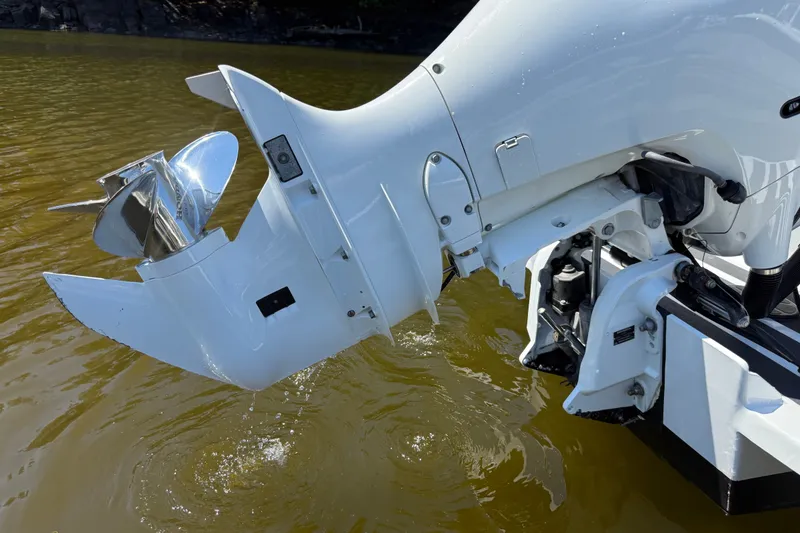 Slide: The Image of Close-up of a Seaway 24 boat's outboard motor propeller in water, 2020 model. - 41