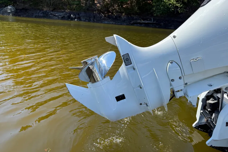 Slide: The Image of Outboard motor of a 2020 Seaway 24 boat in water. - 40