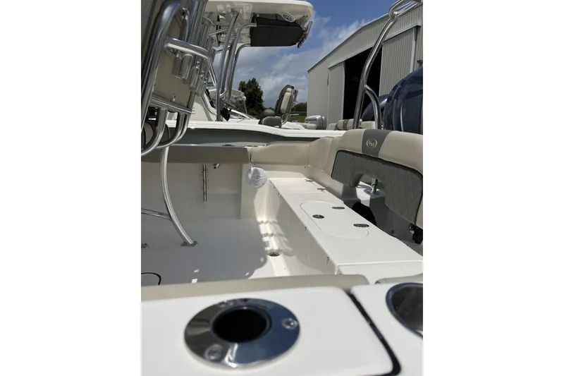Slide: The Image of 2027 Key West 203 FS boat interior with seating and storage compartments. - 5