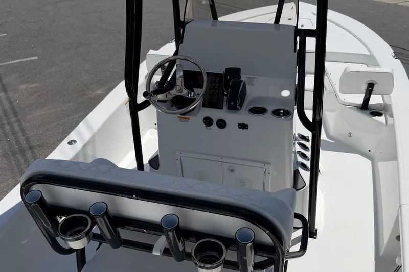 Slide: The Image of The image shows the cockpit of a BlackJack 224 boat with a modern helm station. - 14