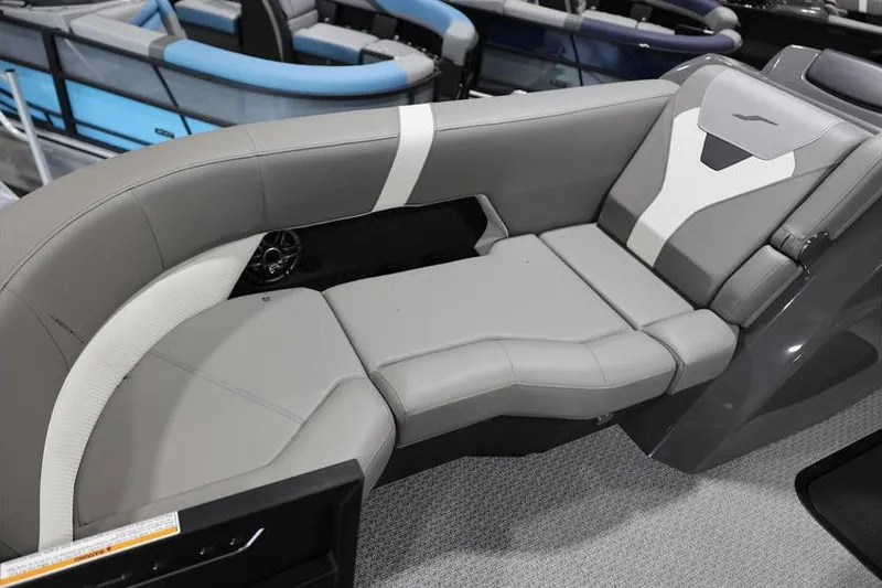Slide: The Image of Luxurious seating on 2026 Evotti 523QL OMNI boat, featuring sleek gray upholstery. - 11