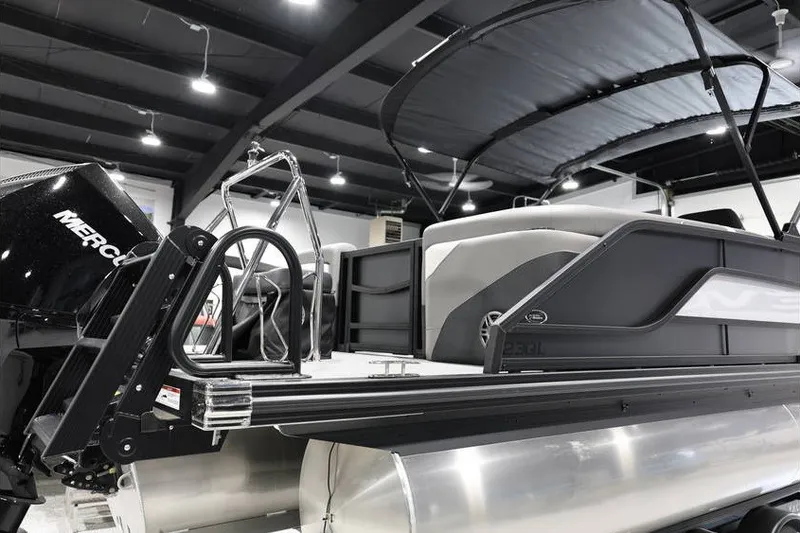 Slide: The Image of 2026 Evotti 523QL OMNI pontoon boat with sleek design and modern features. - 6