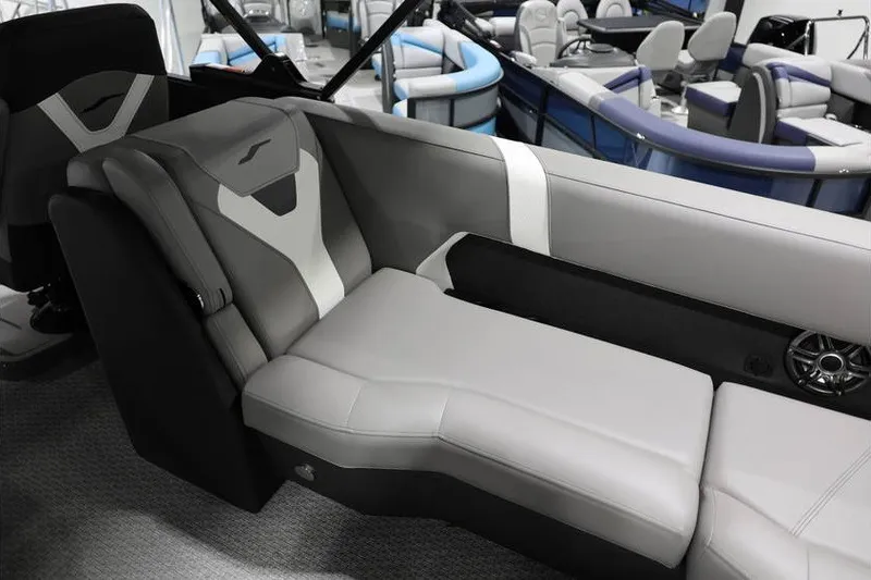 Slide: The Image of Luxurious seating in 2026 Evotti 523QL OMNI boat, featuring sleek gray upholstery and modern design. - 21