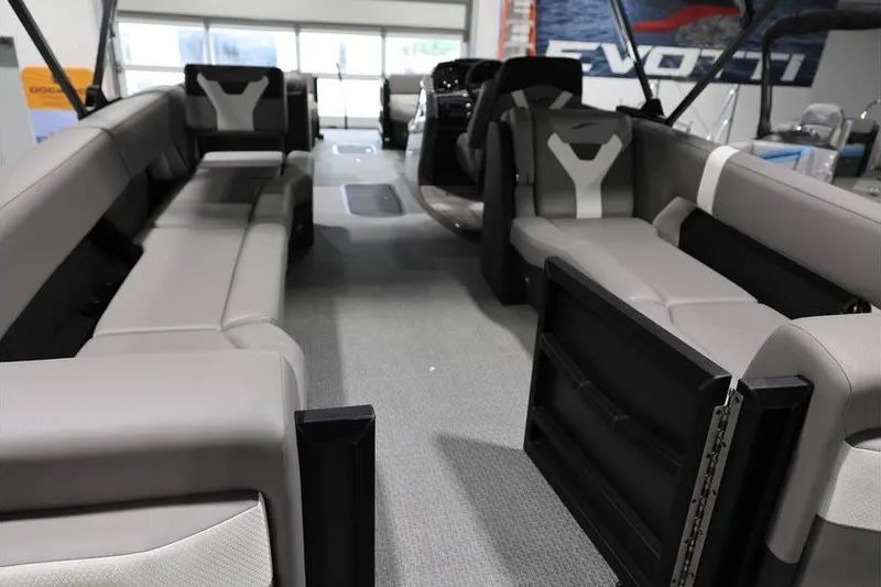 Slide: The Image of Interior of 2026 Evotti 523QL OMNI boat with spacious seating and modern design. - 25