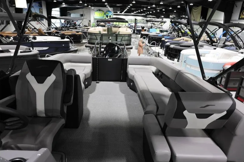 Slide: The Image of Interior view of 2026 Evotti 523QL OMNI pontoon boat at a showroom. - 19