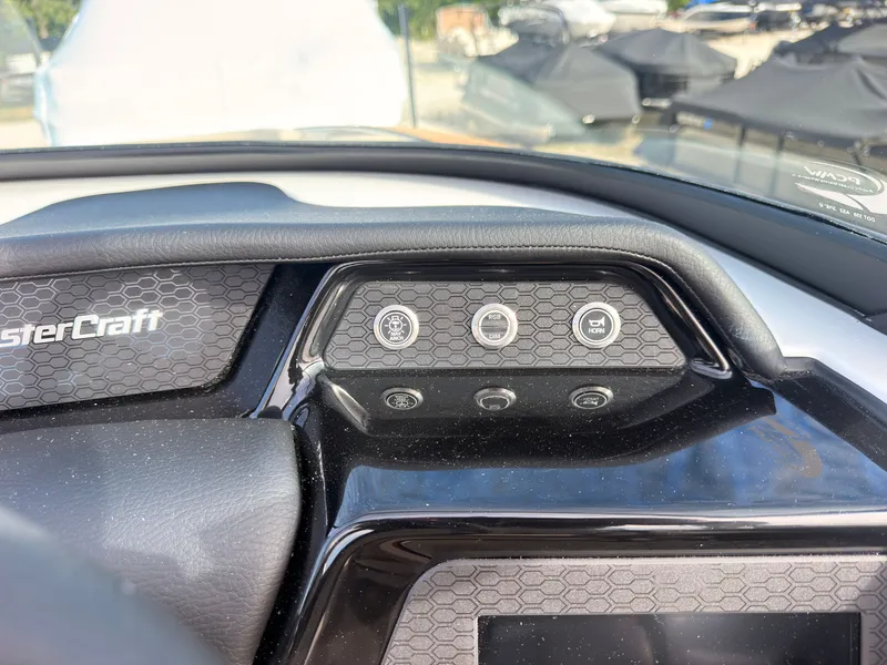 Slide: The Image of Dashboard of a 2027 MasterCraft NXT22 boat with modern controls. - 47