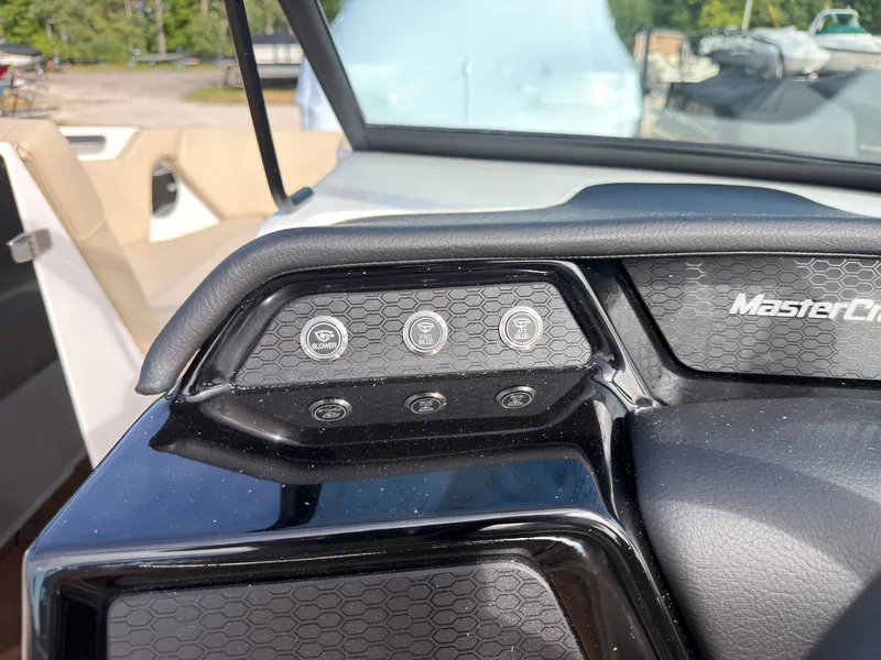 Slide: The Image of The dashboard of a 2027 MasterCraft NXT22 with modern controls. - 46