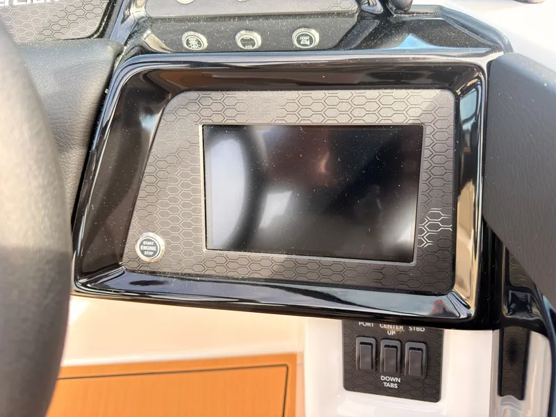 Slide: The Image of The image shows a modern dashboard with a touchscreen display and several switches. - 48