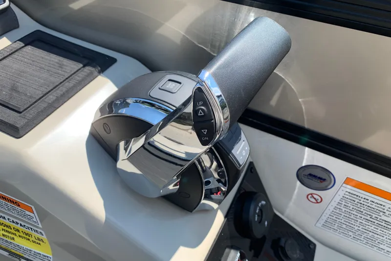 Slide: The Image of Throttle control of 2022 Barletta Lusso 23UC pontoon boat, featuring sleek chrome finish. - 14