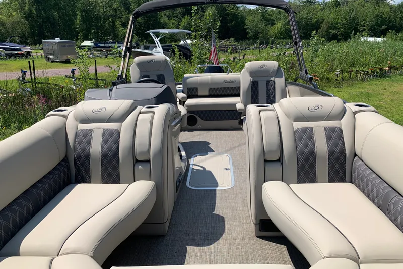 Slide: The Image of 2022 Barletta Lusso 23UC pontoon boat with luxurious seating and elegant design. - 5