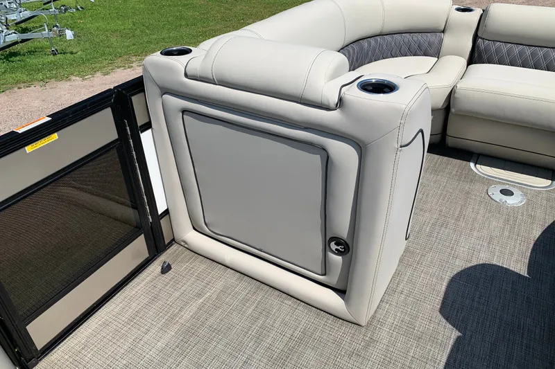 Slide: The Image of 2022 Barletta Lusso 23UC pontoon boat interior with plush seating and cup holders. - 15