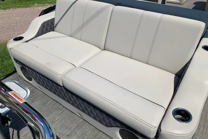 Slide: The Image of 2022 Barletta Lusso 23UC boat seat with cup holders and elegant upholstery. - 8