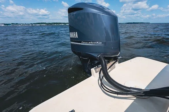 Slide: The Image of 2013 Grady-White Gulfstream 232 with Yamaha outboard motor on open water. - 14