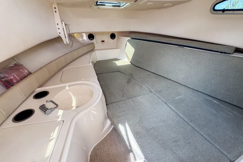 Slide: The Image of Interior cabin of 2013 Grady-White Gulfstream 232 boat with seating and storage. - 29