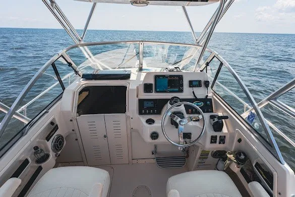 Slide: The Image of Cockpit of 2013 Grady-White Gulfstream 232 boat with ocean view. - 18