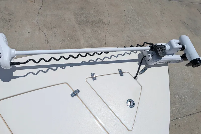 Slide: The Image of 2022 Hewes Redfisher 18 boat with Minn Kota trolling motor on deck. - 21
