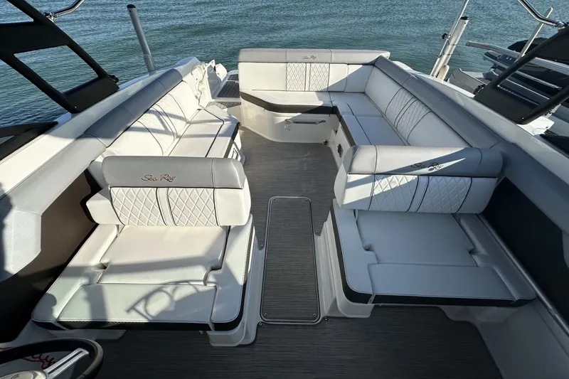 Slide: The Image of Luxurious seating on a 2017 Sea Ray SDX 270 boat, overlooking calm waters. - 7