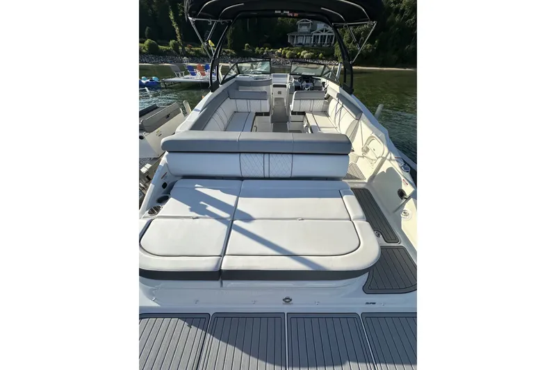 Slide: The Image of 2017 Sea Ray SDX 270 boat interior with spacious seating and sleek design. - 6