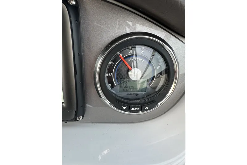 Slide: The Image of Close-up of 2017 Sea Ray SDX 270 tachometer displaying engine RPM and hours. - 10