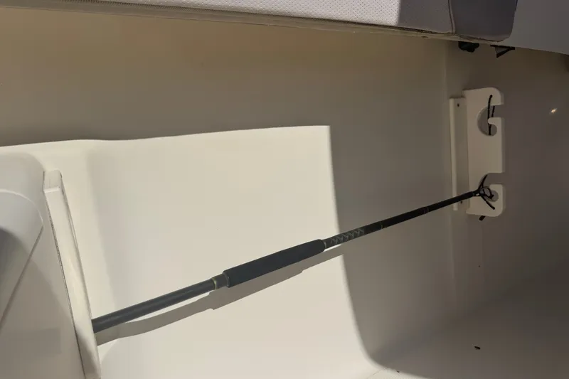 Slide: The Image of Fishing rod holder on 2008 Scout 282 Sportfish boat interior. - 27