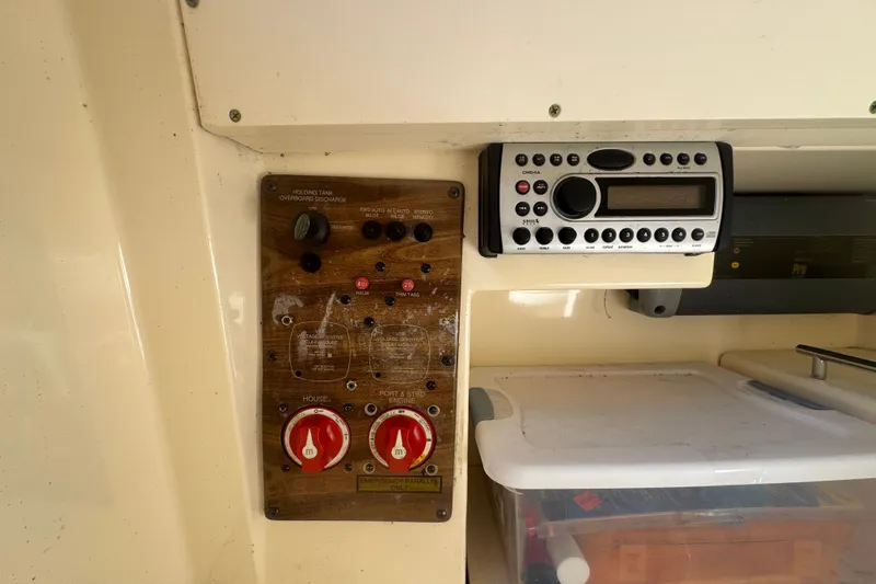 Slide: The Image of Control panel and radio on a 2008 Scout 282 Sportfish boat. - 35