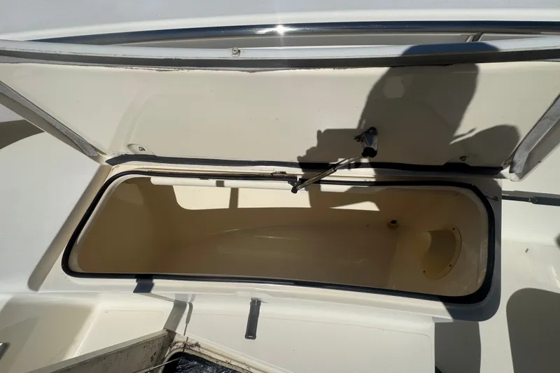 Slide: The Image of Open storage compartment on a 2008 Scout 282 Sportfish boat. - 29