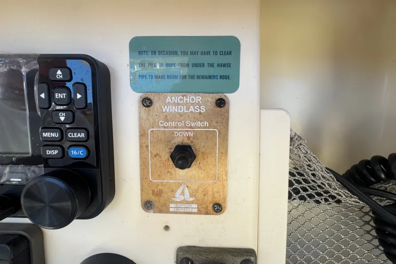Slide: The Image of Control panel of a 2008 Scout 282 Sportfish boat with anchor windlass switch. - 44