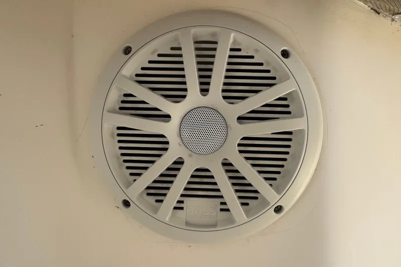 Slide: The Image of Marine speaker on 2008 Scout 282 Sportfish boat, mounted on white surface. - 24