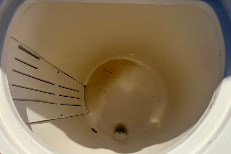 Slide: The Image of Empty storage compartment inside a 2008 Scout 282 Sportfish boat. - 18
