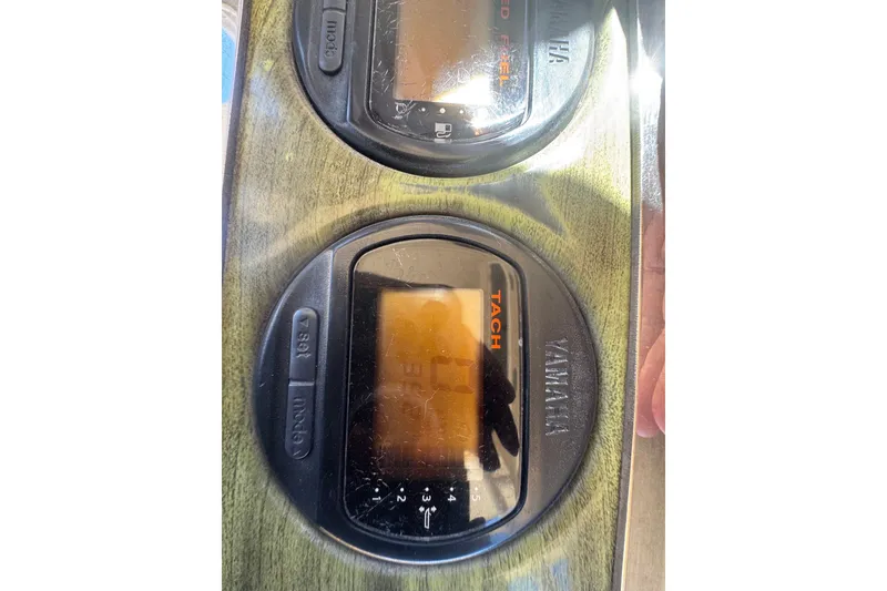 Slide: The Image of Yamaha gauges on 2008 Scout 282 Sportfish dashboard, displaying tachometer readings. - 52