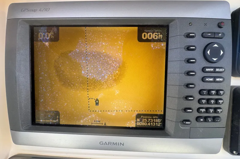 Slide: The Image of Garmin GPSmap 4210 display on 2008 Scout 282 Sportfish boat, showing navigation data. - 43