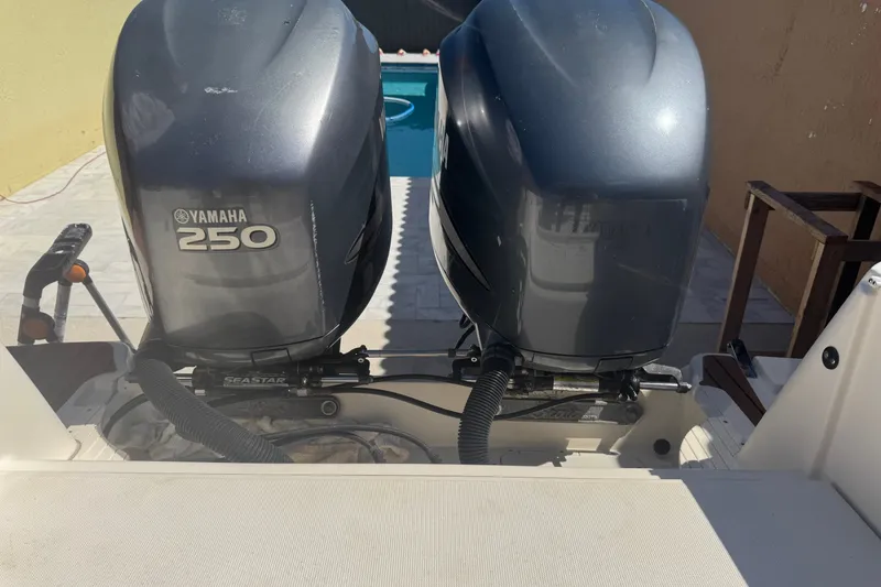 Slide: The Image of Twin Yamaha 250 outboard engines on a 2008 Scout 282 Sportfish boat. - 6