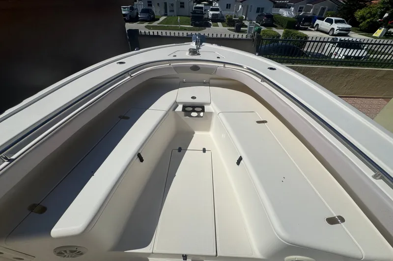Slide: The Image of 2008 Scout 282 Sportfish boat interior with spacious seating and storage compartments. - 32